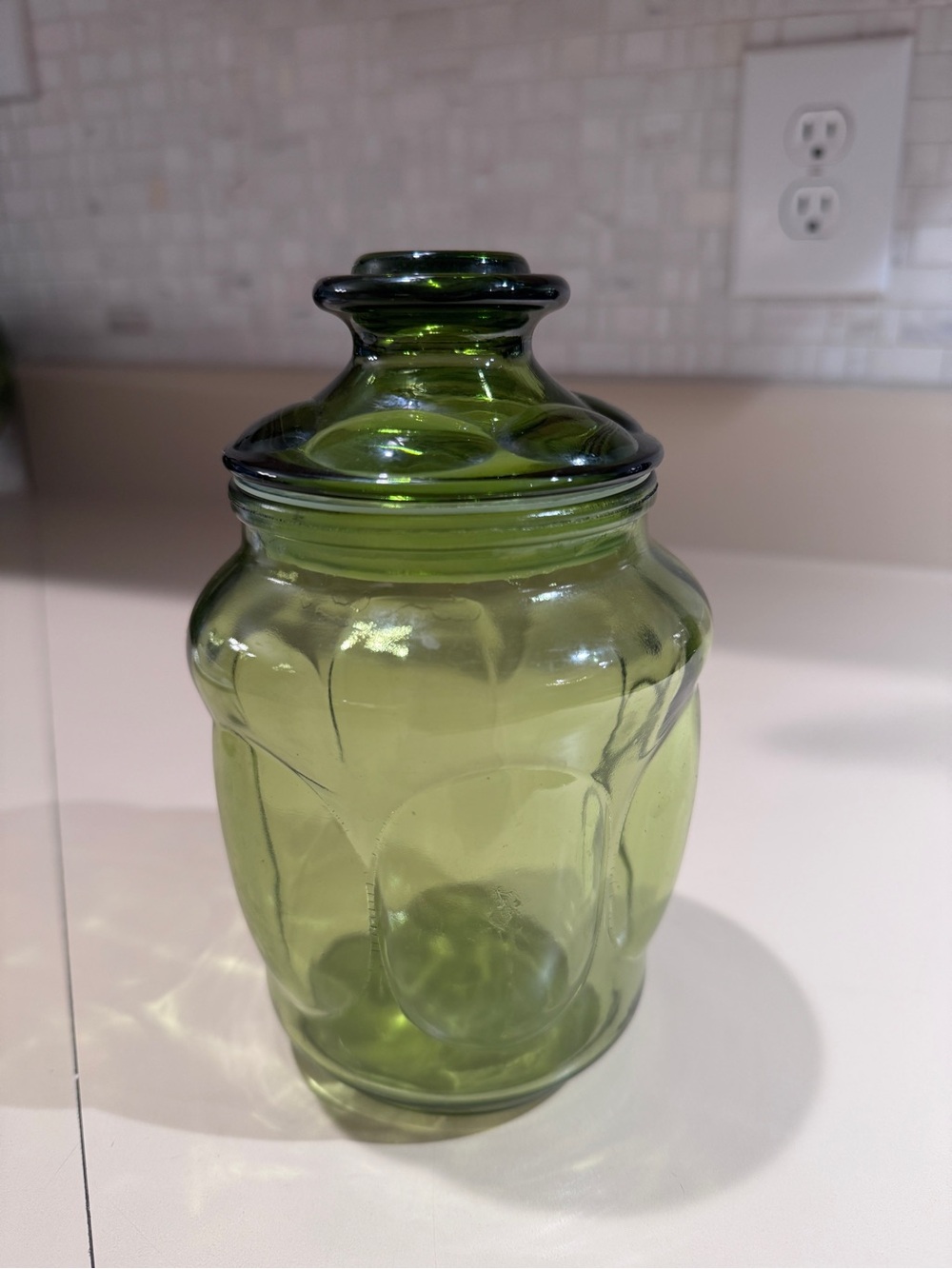 Vintage small green glass jar with lid